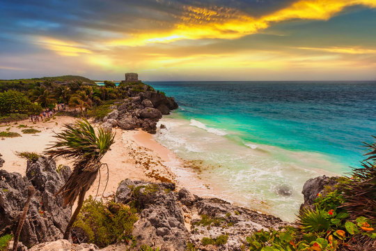 Caribbean beach at the cliff in Tulum at sunset, Mexico