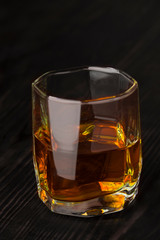 whiskey on old wooden surface