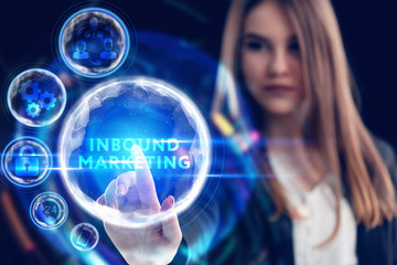 Business, Technology, Internet and network concept. Young businessman working on a virtual screen of the future and sees the inscription: Inbound marketing