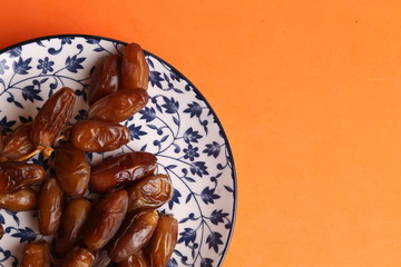 Moroccan dates in color background