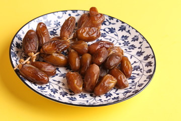 Moroccan dates in color background