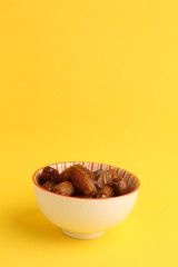 Moroccan dates in color background