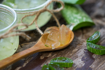 Close-Up Of aloe vera on wooden table.