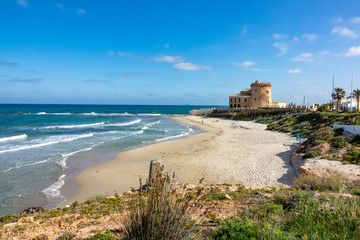 The beach and Horadada tower built in 1591.