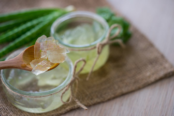 Close-Up Of aloe vera on wooden table.