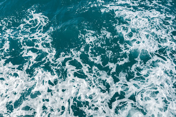 Blue water in the ocean or in the sea. Turquoise waves and Aqua Mente and Phantom Blue. Photos for wallpaper or for background. Abstraction of the waves. Thailand