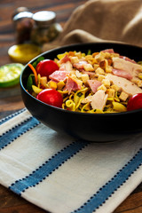 cereal specialties cooked with salad, roasted chicken aiguillette cured with salted and bacon