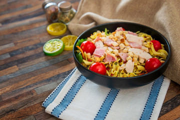 cereal specialties cooked with salad, roasted chicken aiguillette cured with salted and bacon