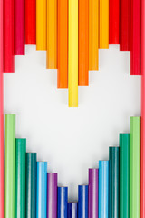 Multicolored pencils in the form of a heart