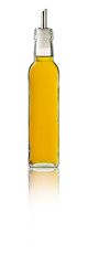 Passionfruit Syrup bottle on white background with reflection.
