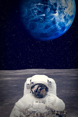 Astronaut on the alien planet. Stars above. The elements of this image furnished by NASA.