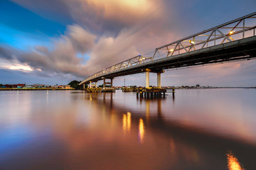 bridge over river at sunset in pontianak indonesia