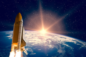 Rocket and stars. Flight of spaceship in outer space. The elements of this image furnished by NASA.
