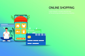 Business concept of online shopping, a man is searching on his laptop to find a new pant and sit near a big credit card and smartphone which contain list of products, customer rating and review.