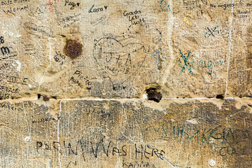Vandalism on ancient walls