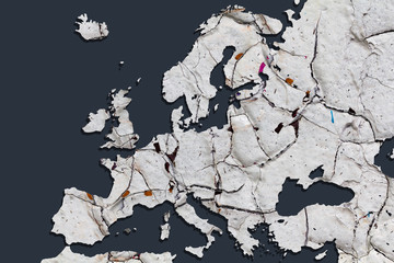 Europe map with many cracks symbolic of contradictions and disagreement.
