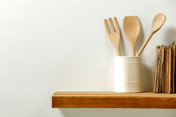 Wooden desk of free space and kitchen interior 