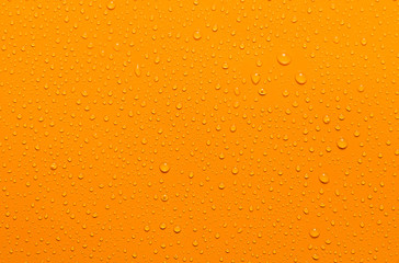 close-up water drop orange background