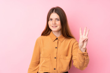 Ukrainian teenager girl over isolated pink background happy and counting three with fingers