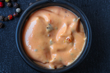 sauce in a sauceboat (fresh serving) menu concept background. top view. copy space