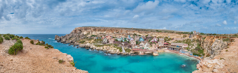 Fototapeta na wymiar Popeye Village at Anchor Bay in Malta