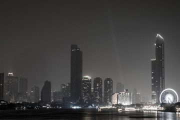 Obraz premium Business architecture, skyscrapers and light trails, Close shot of skyscrapers with lights, Night building. 
