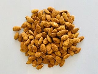 peeled Almonds isolated on white background