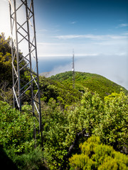 Obraz premium Beautiful image of jungle forest on the mountain and high mobile signal towers