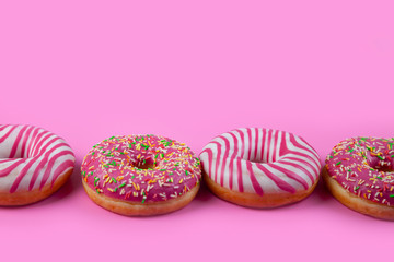 Donuts on a pink background.
