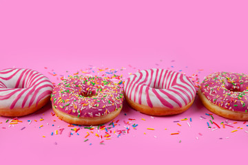 Donuts on a pink background.