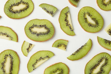 Ripe sweet kiwi on white background, top view