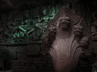 Hindu religion sculpture from stone in historical temple at Thailand