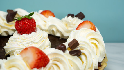 Pie Strawberry Chocolate Whipped Cream Brown Wood Marble Pineapple Blue Yellow Plate Settings