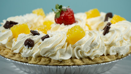 Pie Strawberry Chocolate Whipped Cream Brown Wood Marble Pineapple Blue Yellow Plate Settings