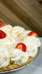 Pie Strawberry Chocolate Whipped Cream Brown Wood Marble Pineapple Blue Yellow Plate Settings