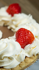 Pie Strawberry Chocolate Whipped Cream Brown Wood Marble Pineapple Blue Yellow Plate Settings