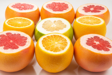Naklejka na ściany i meble Grapefruit, orange, pomegranate, citrus sweetie on white background.
