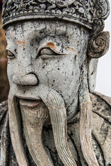 Steinskulptur im Wat Pho Tempel in Bangkok, Thailand