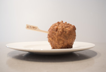 meatball with wooden skewer. Food allergy concept