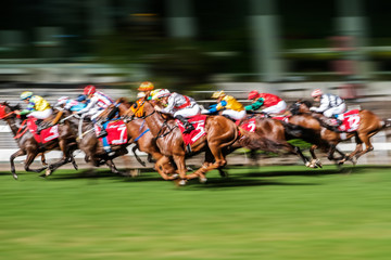 Obraz na płótnie Canvas Horse race motion blur, racing horses