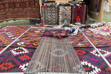 An ancient weaving device. In the East, carpets are woven on it