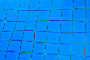 Water ripples at swimming pool background