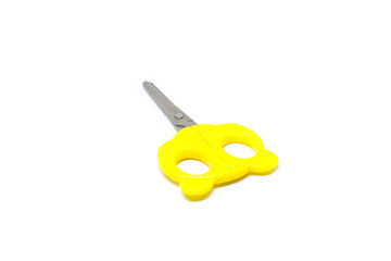 Yellow scissors isolated on white background