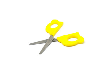 Yellow scissors isolated on white background