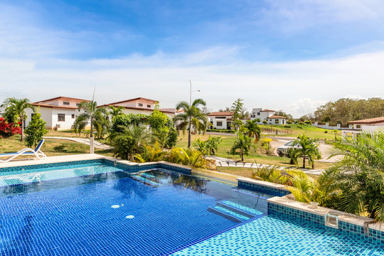 Swimming pool and the houses in the expat’s community project near Las Tablas in Panama.