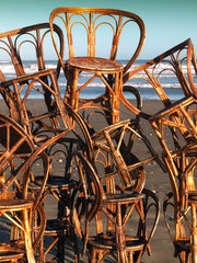 Chairs waiting for vacationers on the beach
