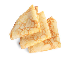 Folded fresh thin pancakes isolated on white, top view