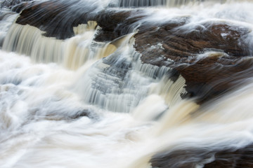 Landscape of Manido Falls captured with motion blur, Presque Isle River, Porcupine Mountains Wilderness State Park, Michigan's Upper Peninsula, USA
