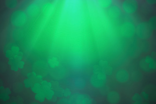 ST Patrick's day background green clover leaf bokeh lights defocused for ST Patrick's day celebration design background