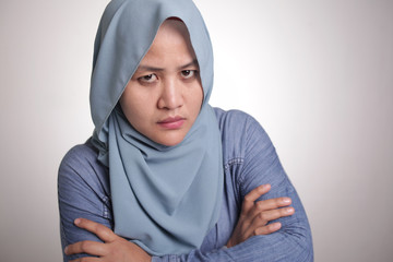 Muslim Woman Looking Cynically